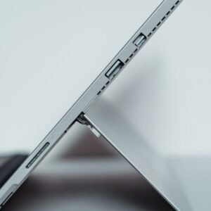silver iphone 6 on white table
